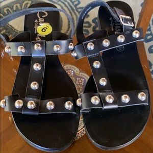 Callista Black Leather Sandal Silver Grommet